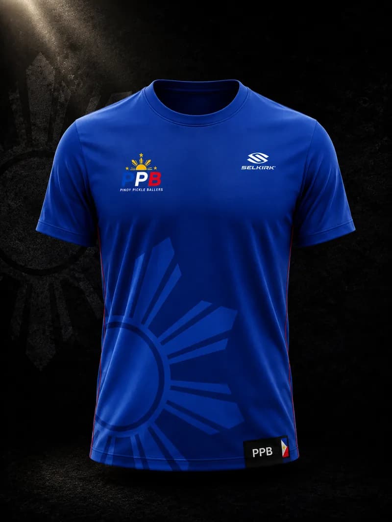 The PPB Official Shirt, Limited Edition — royal blue jersey with red side piping and the PPB logo on the left chest.